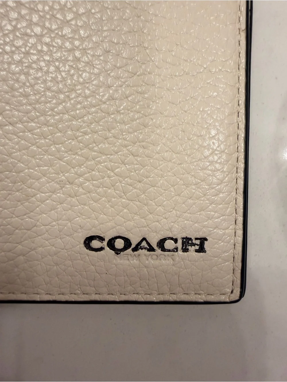 Coach Men’s Pebbled Leather Bifold Wallet — Cream